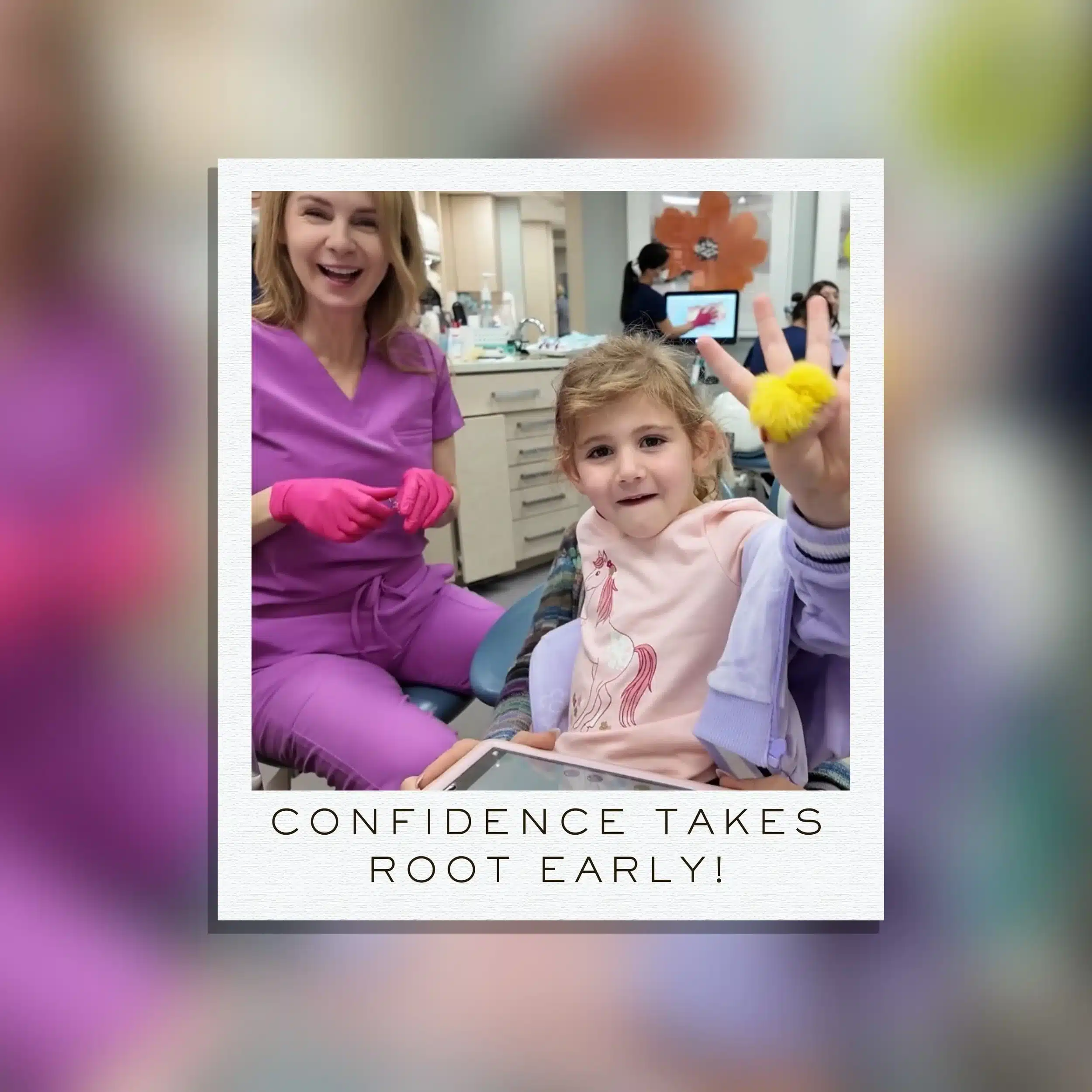 Dr. Salzer smiling alongside a young orthodontic patient holding up a fuzzy yellow pom-pom, celebrating early confidence and a positive dental experience.