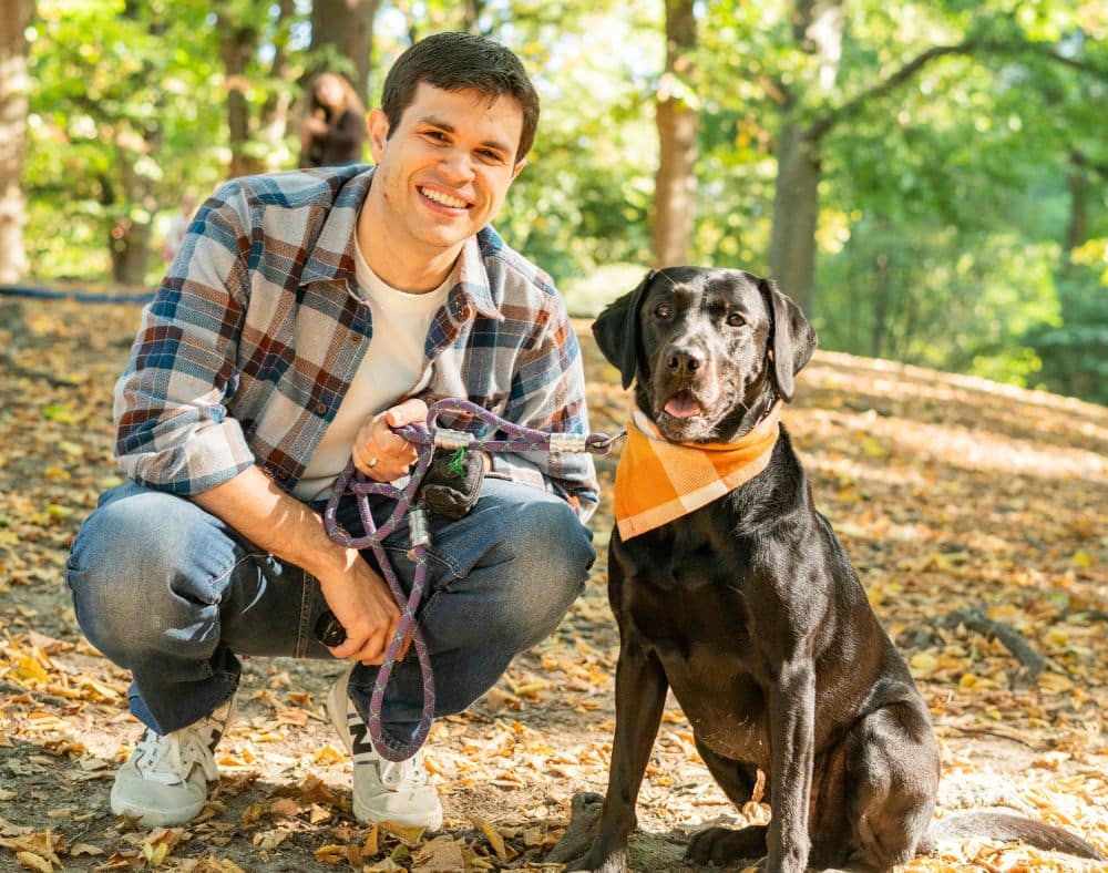 Dr. Andrew Lemchen with Myka, the retainer dog NYC patients love, in the park